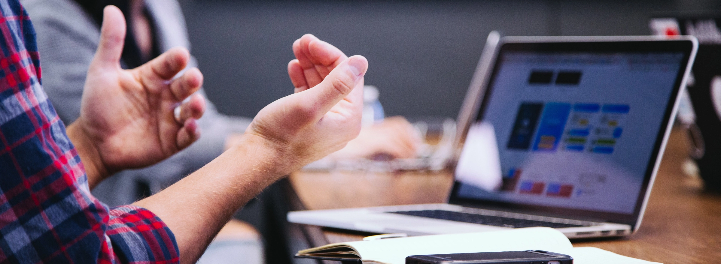 Online accountants discussing facts with small business owner