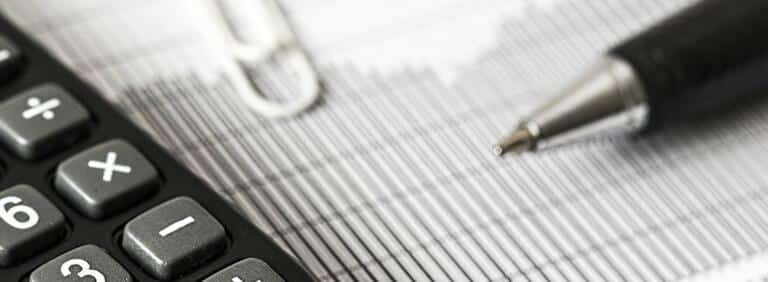 calculator-on-top-of-tax-forms